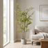 Bambú UV artificial Dekogreen decorando un salón moderno y luminoso