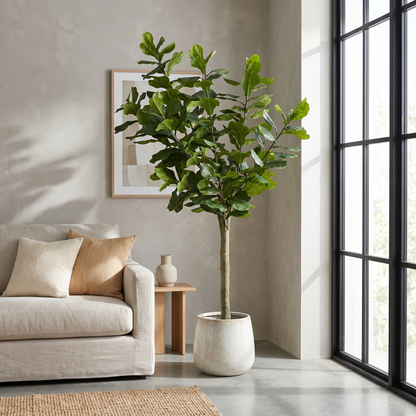 Ficus Lyrata alto artificial Dekogreen decorando un salón moderno y luminoso