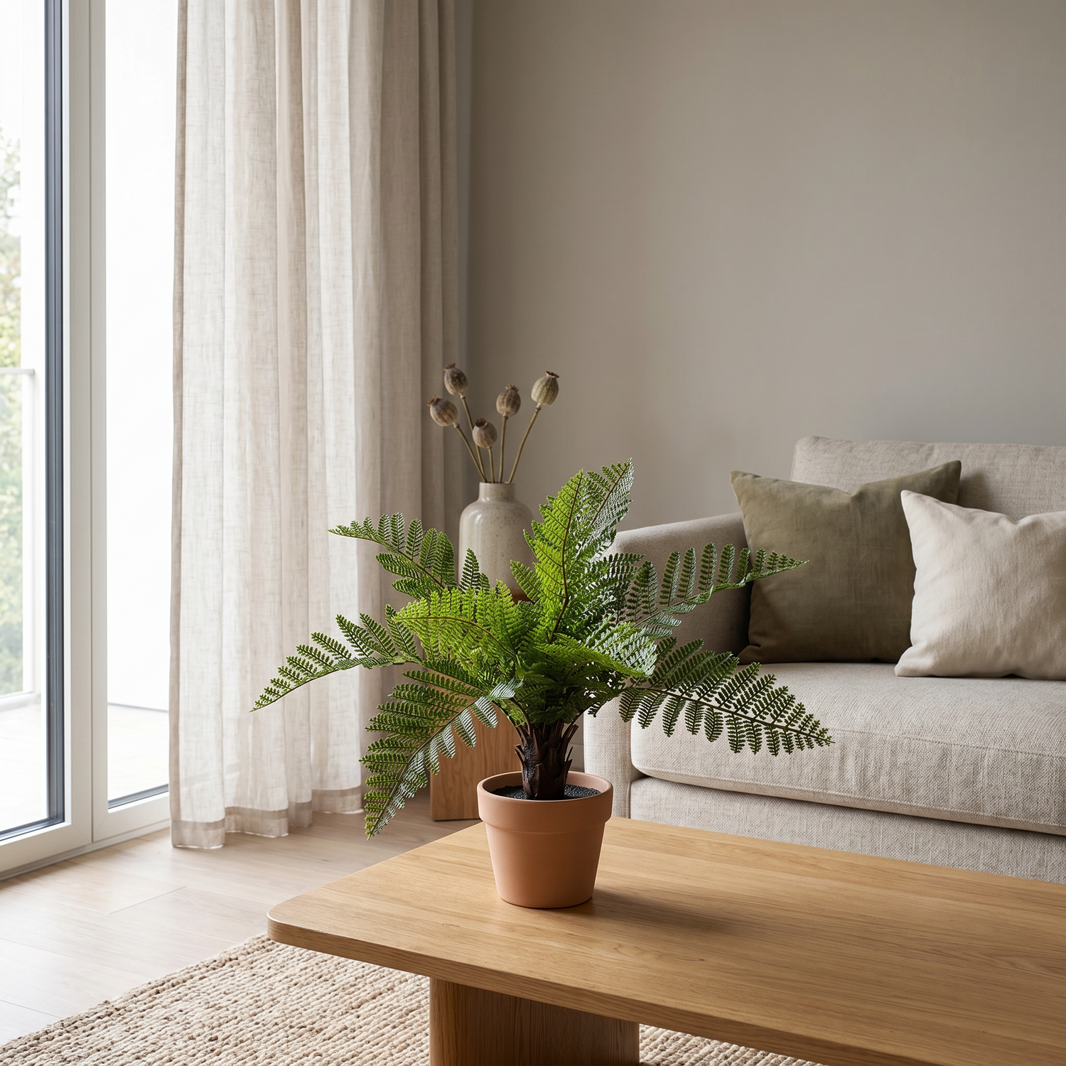 Helechos ignífugos de 25 cm artificial Dekogreen decorando un salón moderno y luminoso